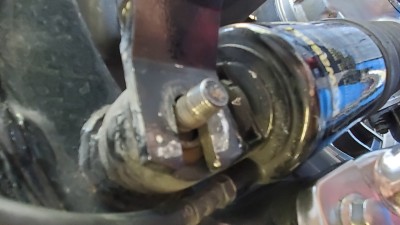 Stripped upper left side shock bolt 1.jpg